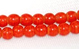 Faux coral round beads