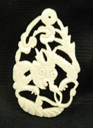 Vintage carved bone pendant