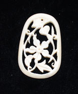 Vintage carved bone pendant