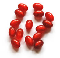 Vintage red moonglow Lucite oval beads