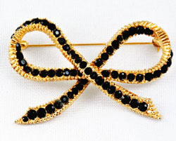 Vintage black crystal bow brooch