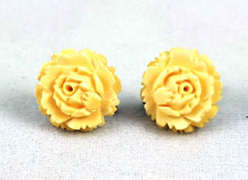 Vintage bone flower screwback earrings