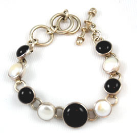 Sterling bracelet with black onyx and coin pearls