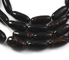 Vintage large black coral oval tube beads