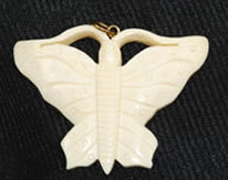 Vintage bone butterfly pendant