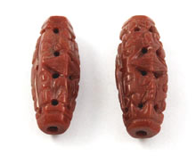 Brown Jade carved cylinder beads