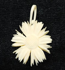 Vintage carved ivory floral pendant