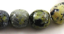 Vintage serpentine barrel beads